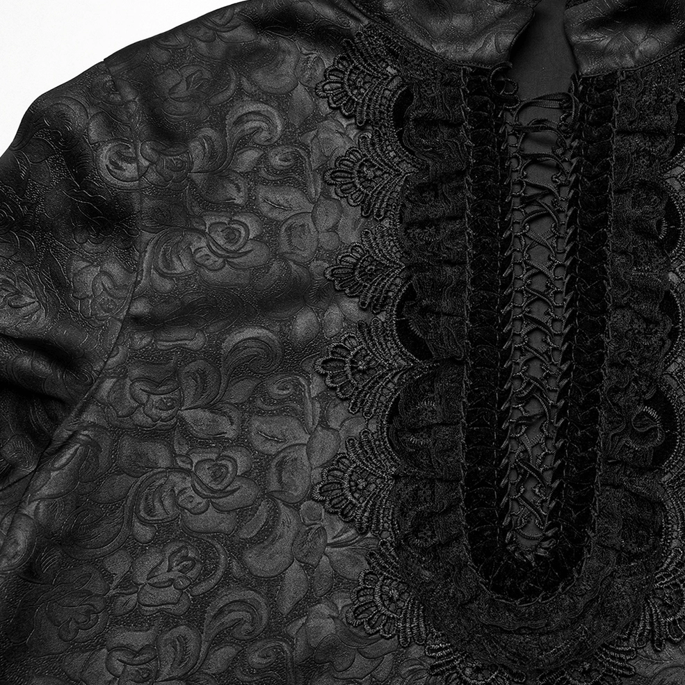 Detailed view of embroidered lace trim and floral jacquard fabric on gothic shirt front