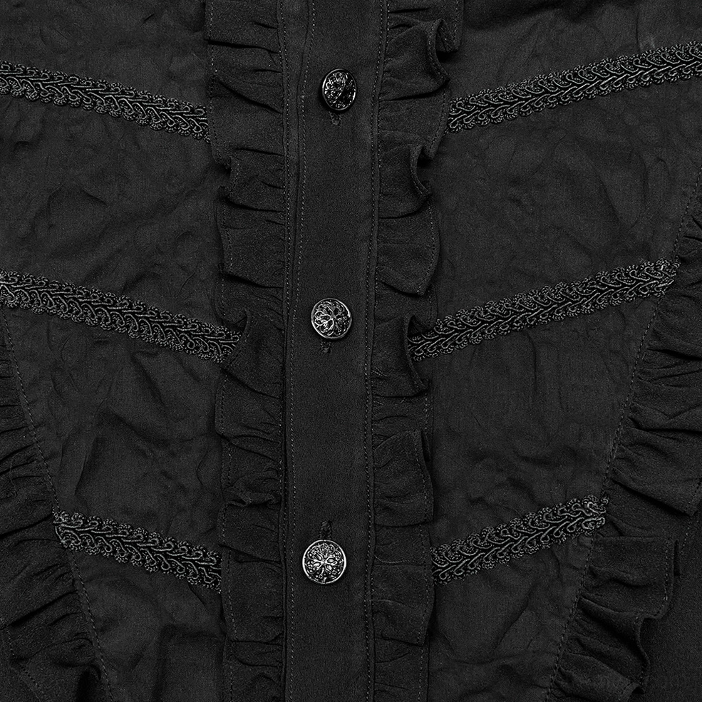Close-up detail of Victorian gothic shirt placket showing vintage metal cherry blossom buttons, ruffled frills, and embroidered lace trim
