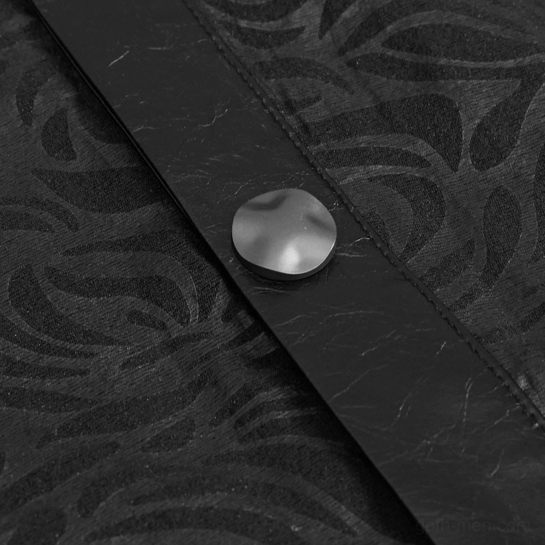 Detailed close-up of black gothic shirt placket with PU leather accent and round metal snap button fastening, alternative fashion craftsmanship