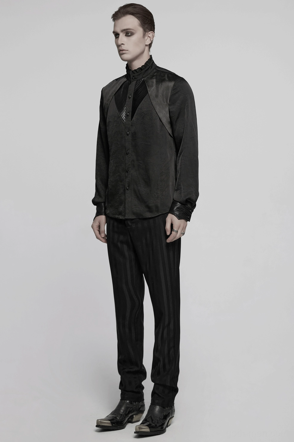 Pleated gothic shirt detail view highlighting satin-finish panels and dimensional design elements