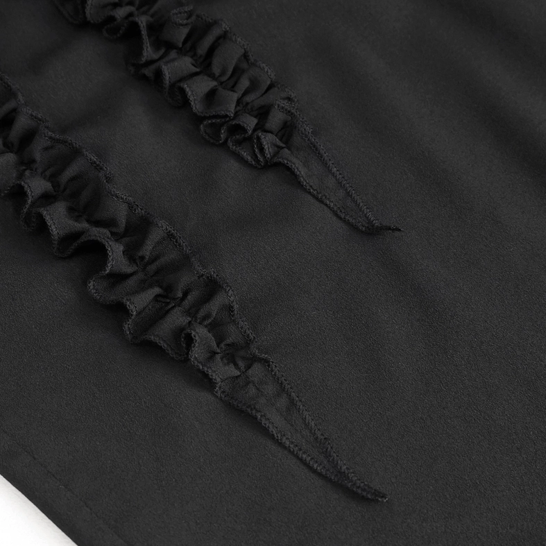 Close-up texture of black gothic shirt frilled ruffle with lace trim and solid black fabric weave