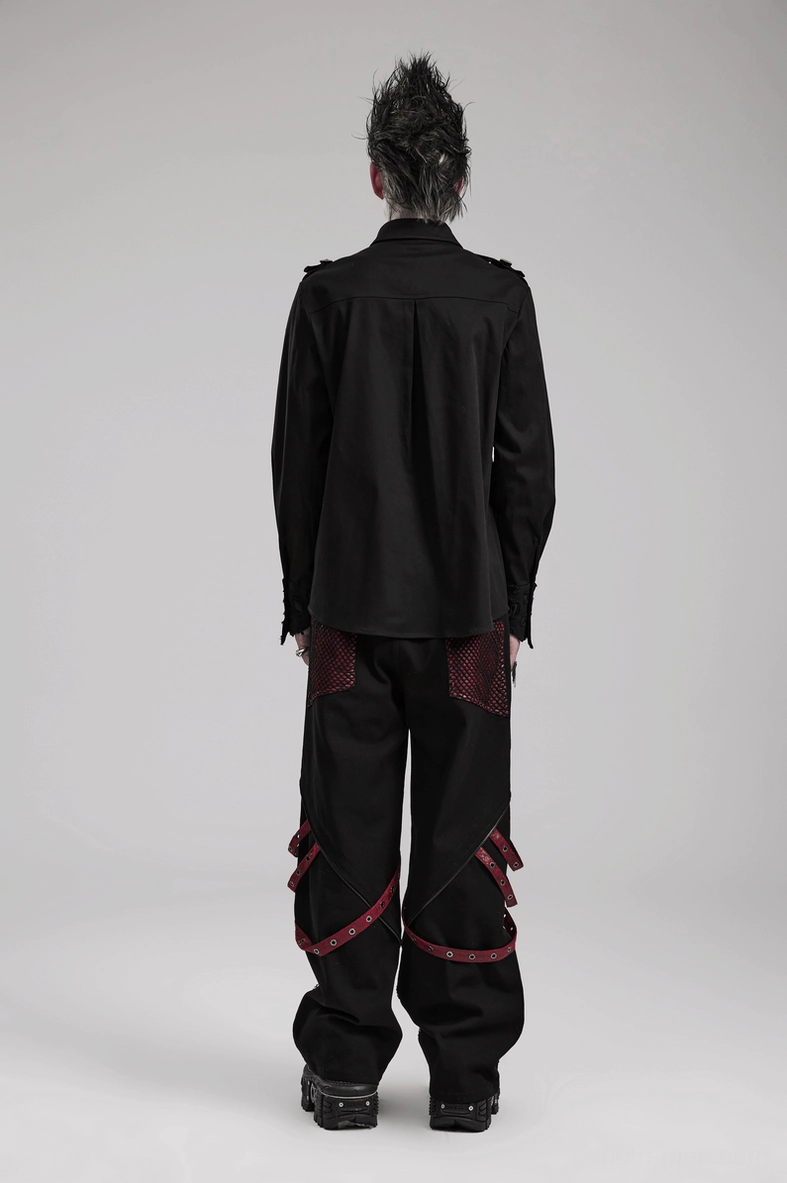Black studded gothic shirt sizing reference showing garment measurements and fit proportions on model