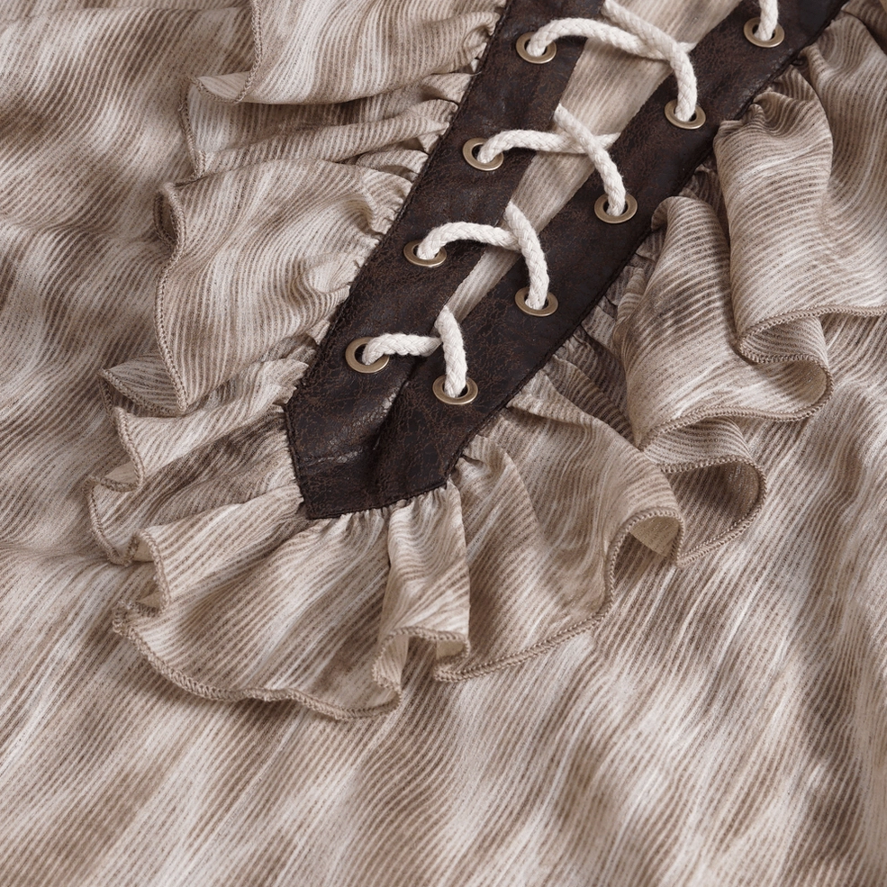 Victorian gothic ruffled shirt styling detail showing layering and silhouette drape of puffed sleeves