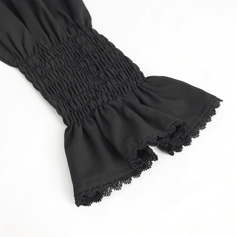 Close-up detail of smocked elastic wrist cuff with lace trim on black gothic shirt