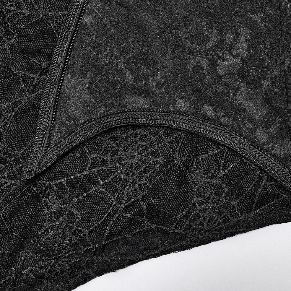 Spiderweb and jacquard texture close-up of gothic shirt fabric showing curved seam trimming detail