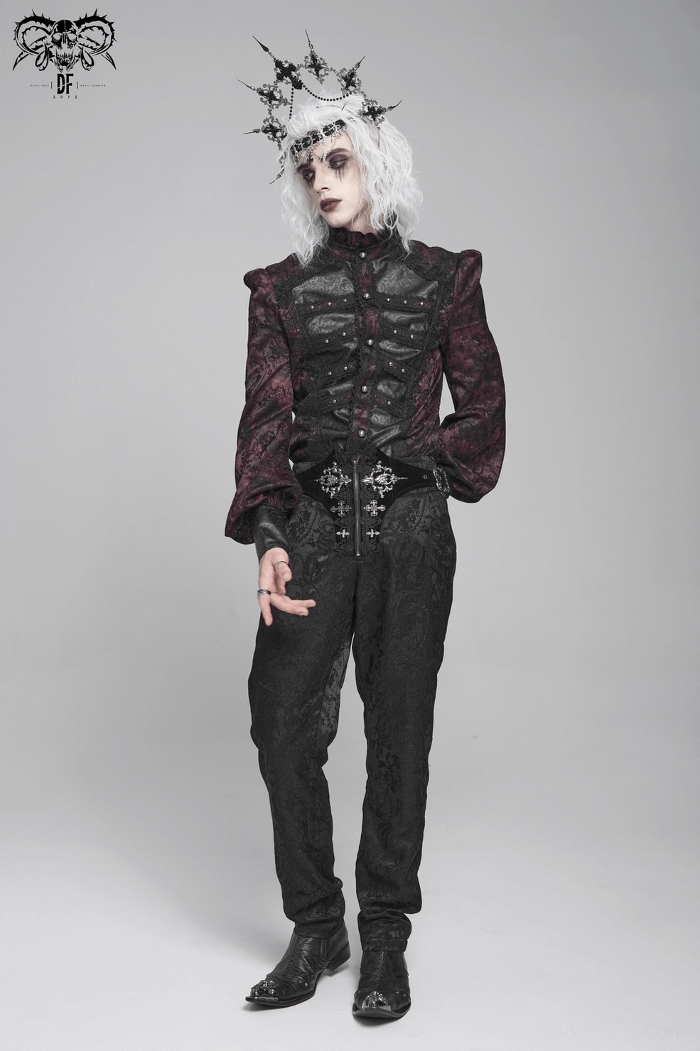 Textured close-up of burgundy marbled jacquard and faux leather combination on gothic shirt