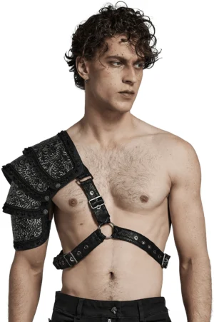 Black embossed leather gothic shoulder guard harness worn by male model, front studio view