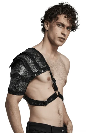 Left profile view of black embossed gothic shoulder harness with adjustable cross chest straps and o-ring hardware