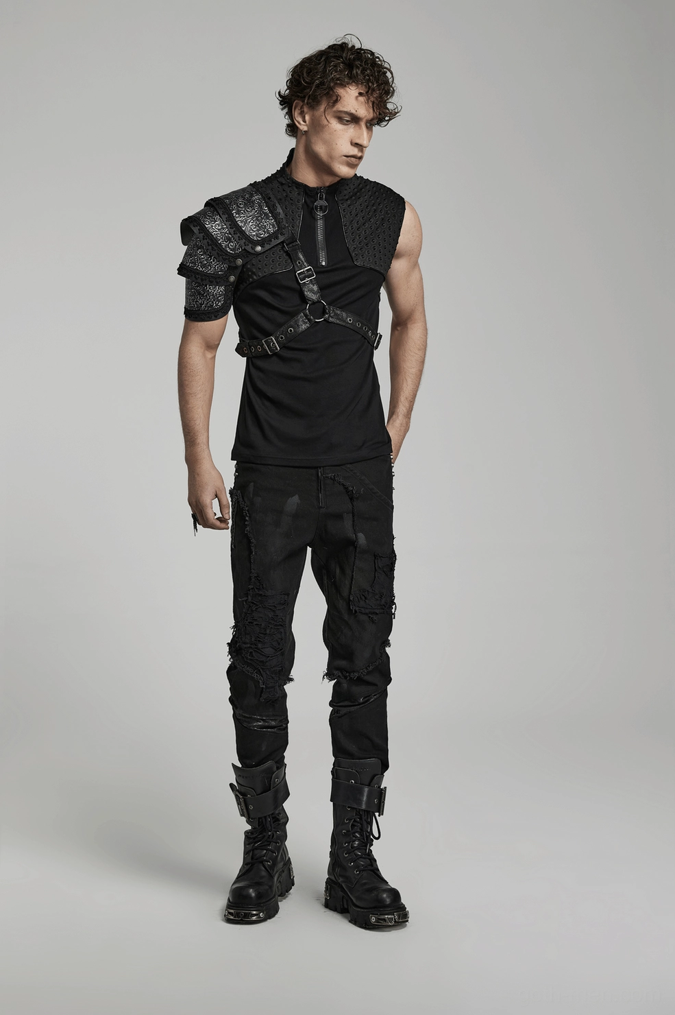Gothic shoulder armor harness highlighting flexible snap-button articulated segments and industrial hardware design
