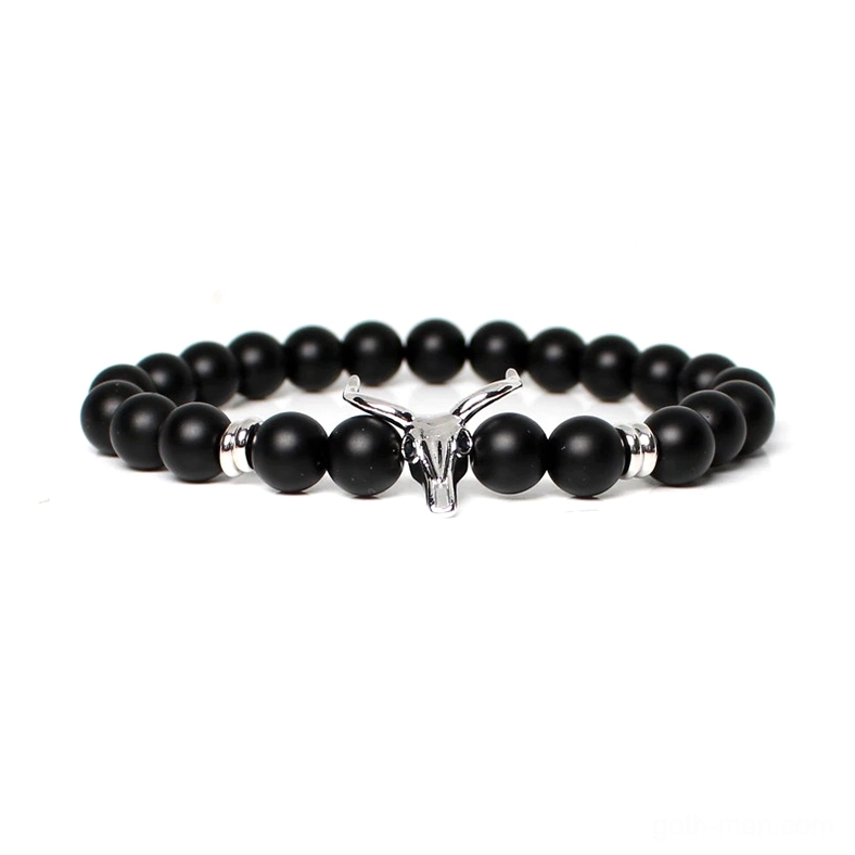 Silver bull skull centerpiece on black stone beaded men's gothic bracelet, detailed metalwork