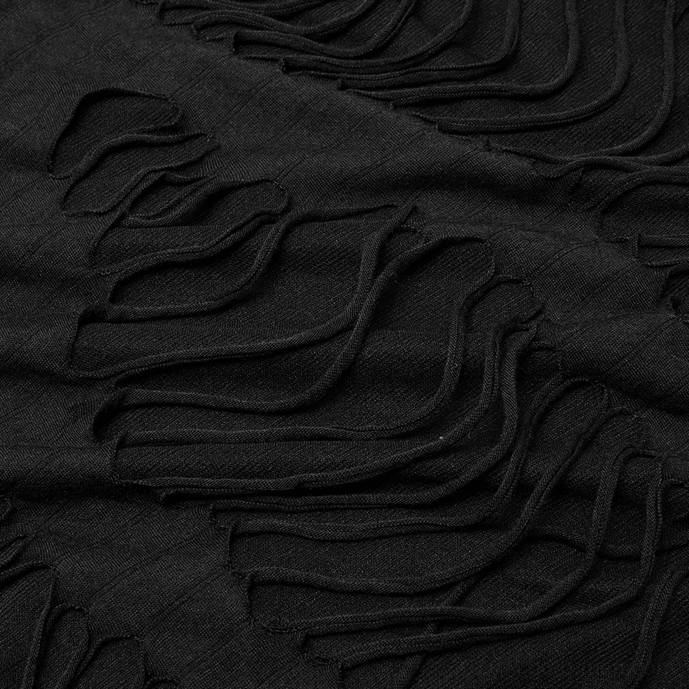 Macro photography of skeleton ripped sweatshirt fabric showing layered shredded texture and mesh underlayer
