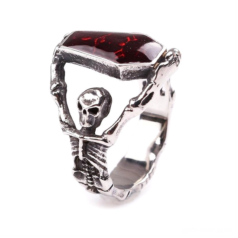 Unisex gothic skeleton ring with red coffin stone - side oblique angle showcasing antique silver-tone finish and stone setting
