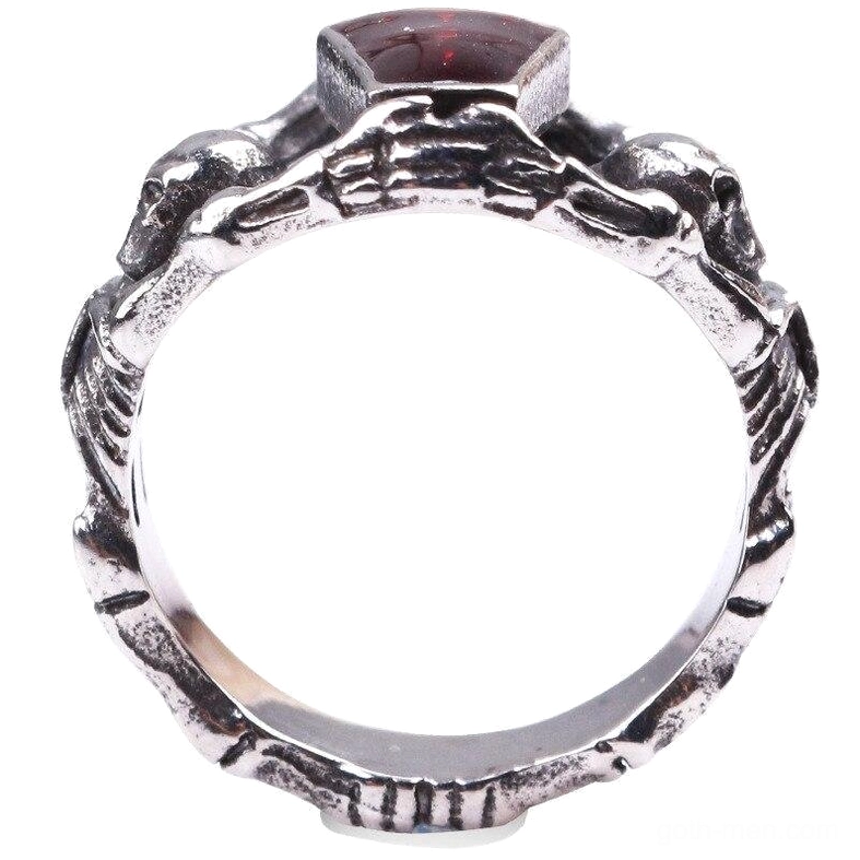 Alternative skeleton band ring overhead view - silver metal with red gem and intricate skeleton motifs