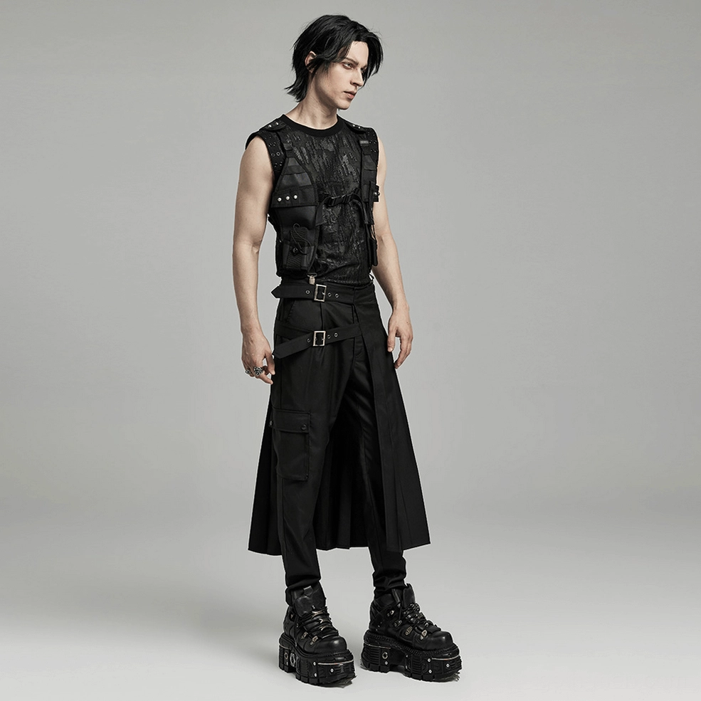 Full body goth punk styling with black asymmetrical pleated skirt paired with studded vest and platform boots, complete alternative look