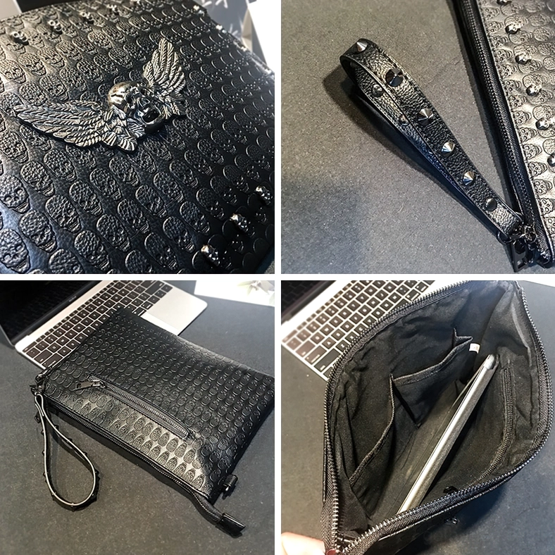 Close-up of gothic bag front featuring winged skull emblem and metal studs with embossed texture