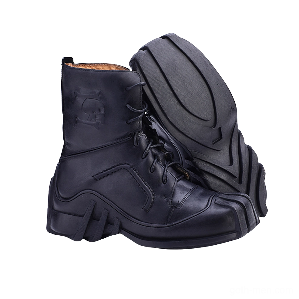Black leather gothic combat boots with skull embossing and rugged outsole tread pattern
