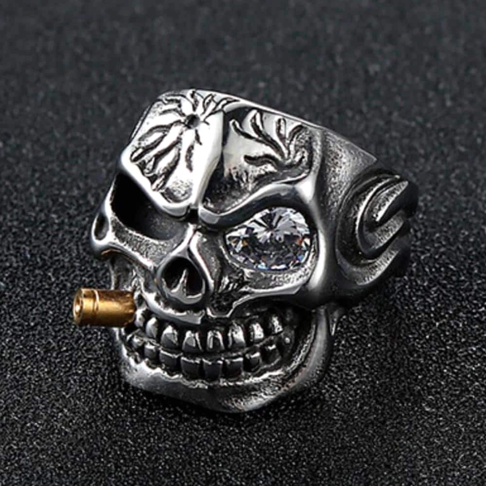 Stainless steel skull biker ring dark background multi-angle view showing flame patterns and gothic craftsmanship