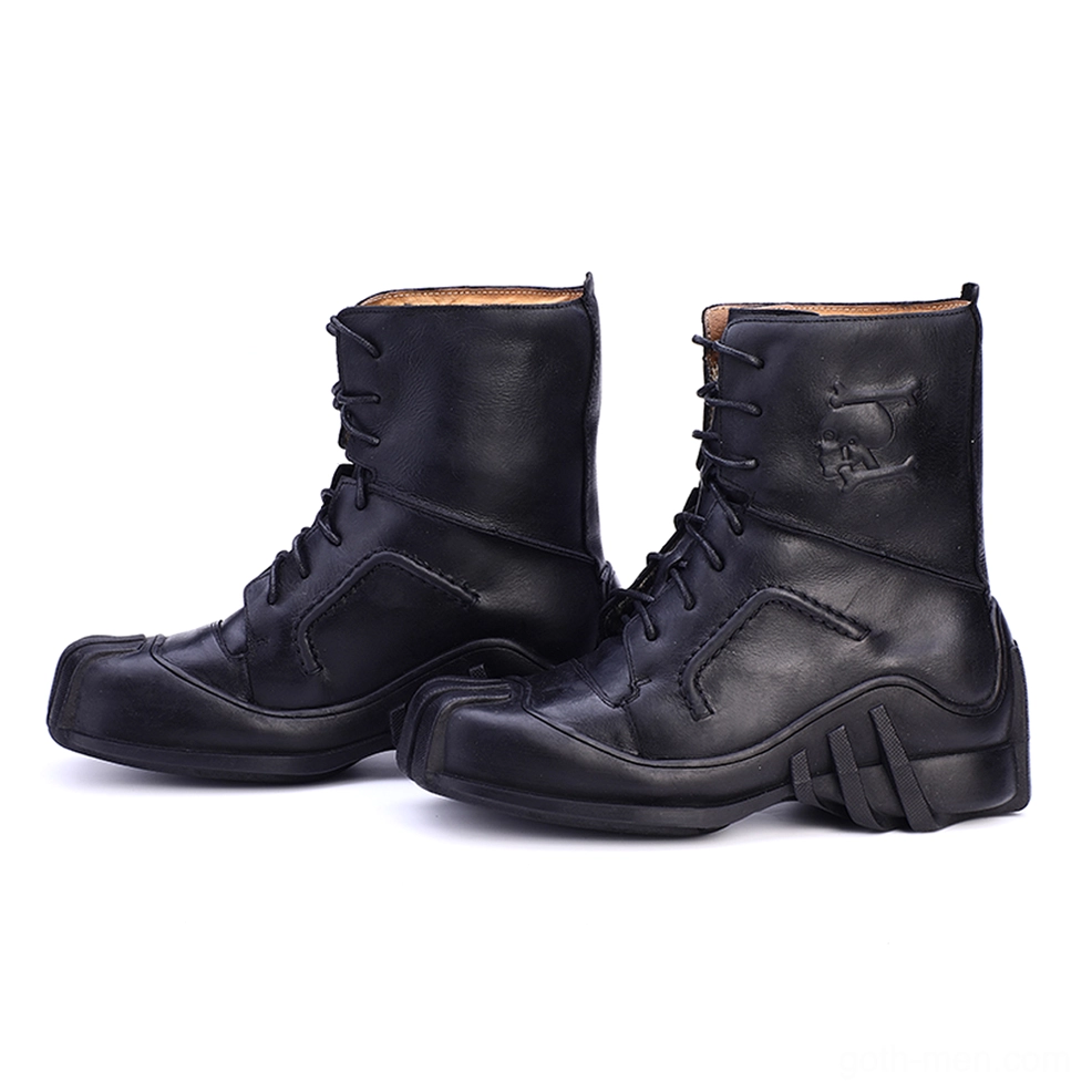 Pair of black leather gothic biker boots frontal side view parallel arrangement heavy-duty sole