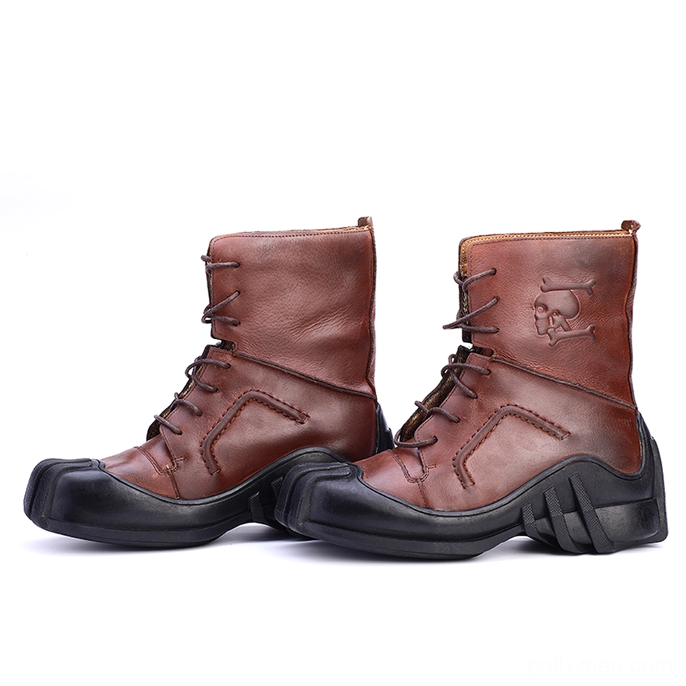 Pair of brown leather gothic biker boots front side view lace-up style alternating placement