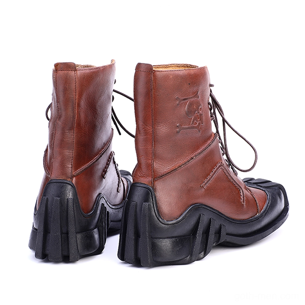 Pair of brown leather ankle boots rear view showing heel tread and embossed heel logo detail