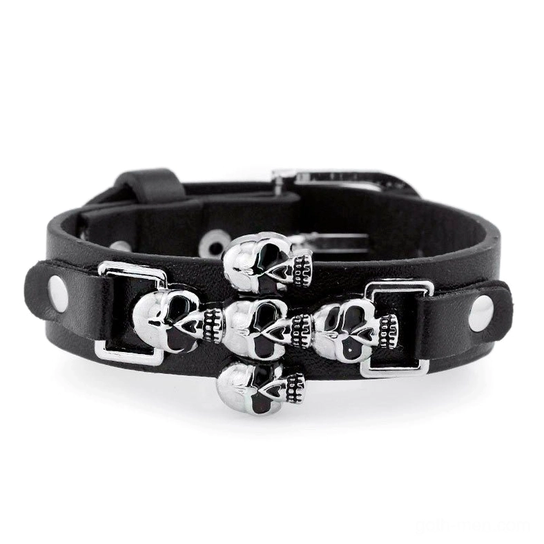 Multiple skull leather gothic bracelet design featuring dual leather straps with several silver skull ornaments
