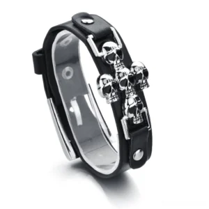 Skull leather gothic bracelet with adjustable studs and silver metal skull decoration on black leather strap
