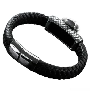 Gothic skull bracelet side profile displaying textured leather weave and silver ornament with decorative hat detail