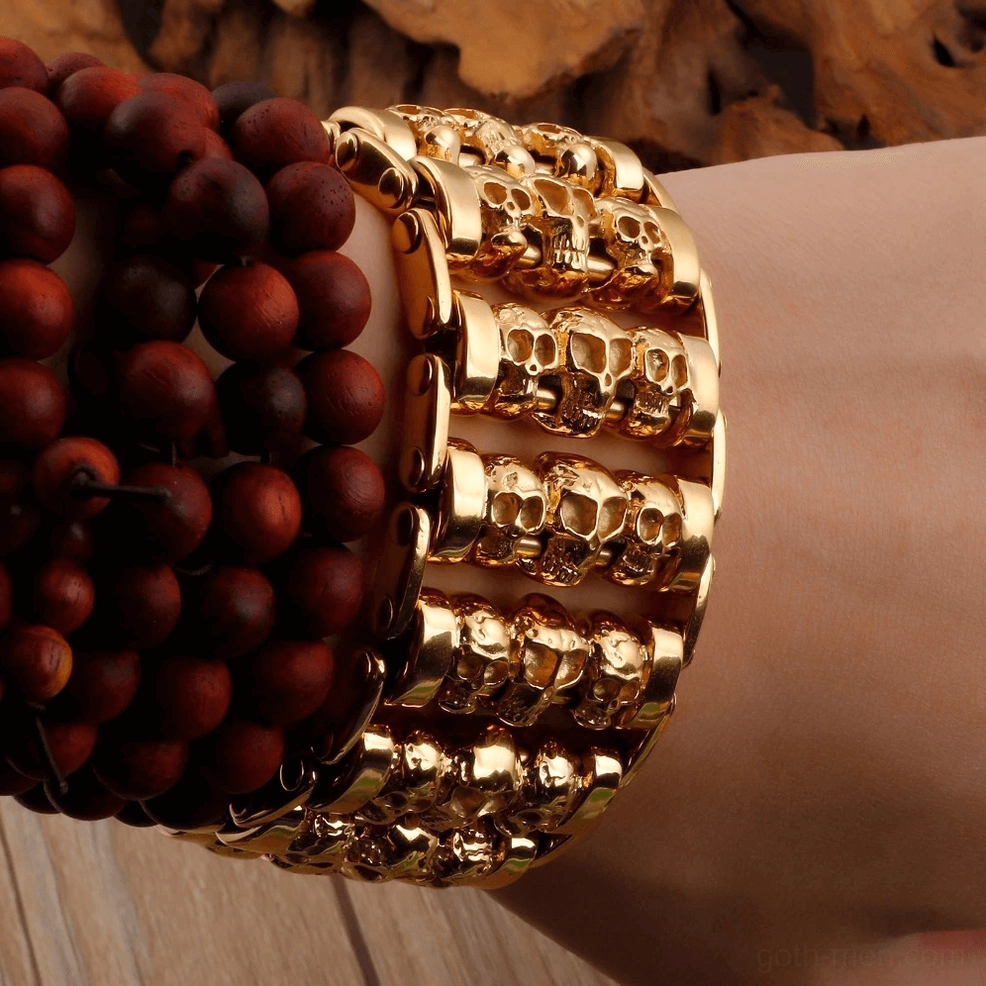 Multiple gothic skull chain bracelets displayed together showing different sizes and color options