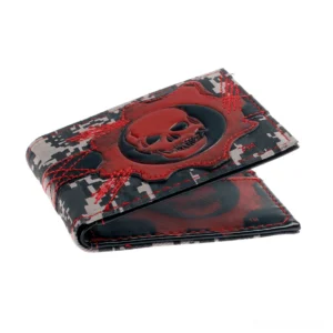 Dark camo leather wallet tilted side view displaying embossed skull emblem and decorative red stitching detail