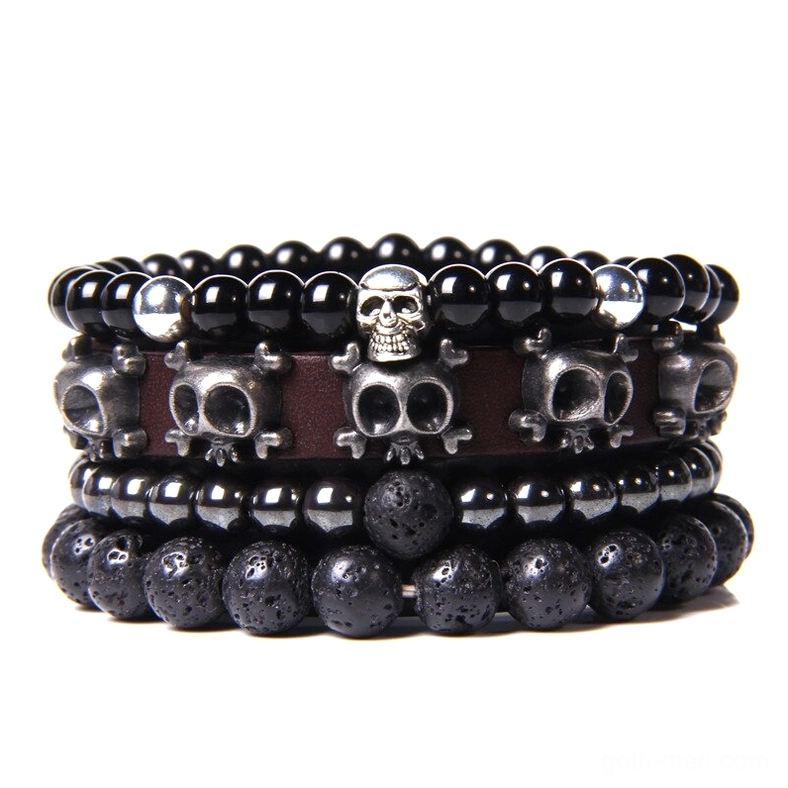 Multi-strand skull charm gothic bracelet set with natural stone beads and vintage leather - handmade dark aesthetic jewelry featuring prominent memento mori symbols