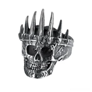 Regal skull crown ring stainless steel gothic statement jewelry left front oblique view with aged silver finish and intricate carved details
