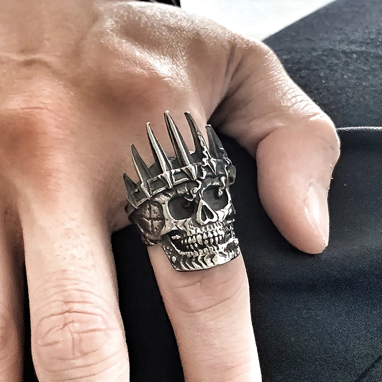 Regal skull crown ring worn on male finger side view real wearing scale gothic stainless steel statement ring