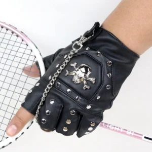 Black faux leather fingerless gloves worn on hand holding tennis racket, side view displaying metal skull and chain detail