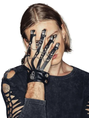 Gothic punk half-finger skull leather glove for men - front close-up view on male model wearing dark alternative fashion