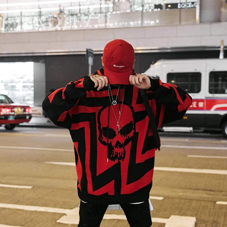 Red and black skull print gothic hoodie detail shot dripping graphic design pattern
