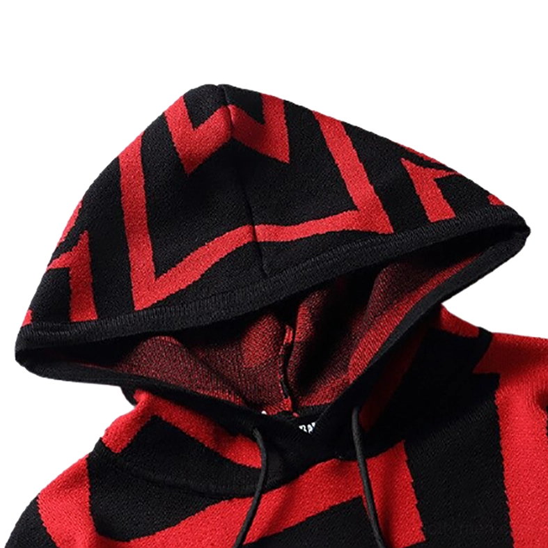 Close-up overhead shot red and black gothic skull hoodie knitted texture geometric detail
