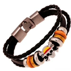 Handcrafted gothic skull leather bracelet with braided black PU leather, enamel skull charm, and alloy metal accents - side close-up detail view