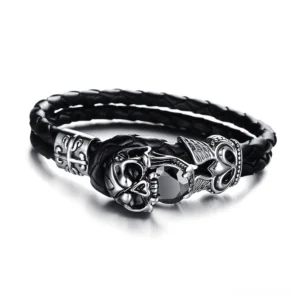 Gothic skull charm leather bracelet front view with black cubic zirconia stone detail, stainless steel skull ornament on braided PU leather