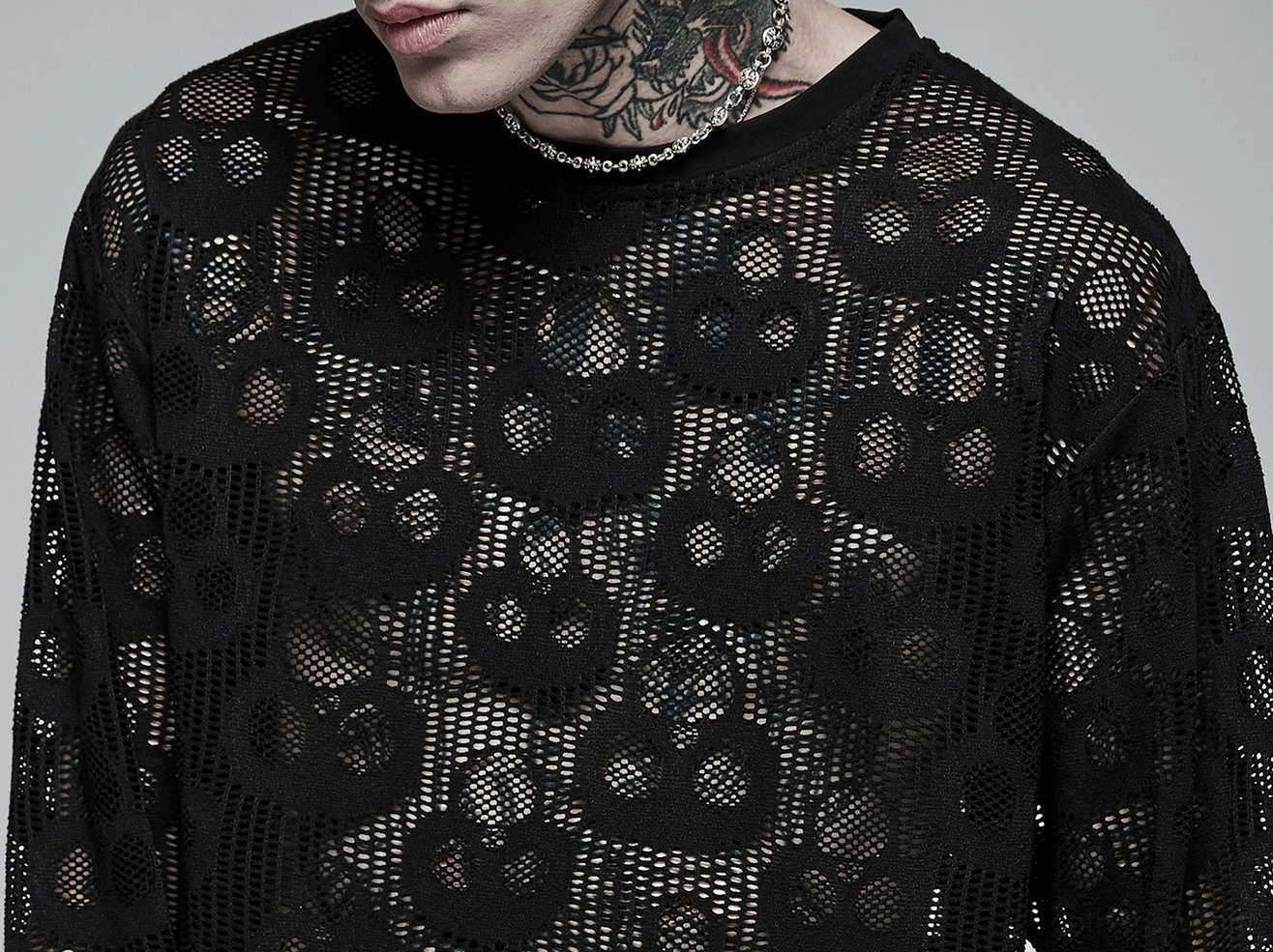 Close-up view of sheer black skull mesh fabric and neckline detail