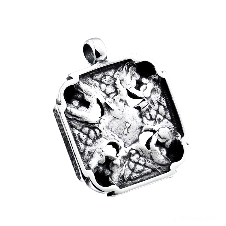 Back side of gothic skull pendant showing embossed dark relief pattern and polished stainless steel texture with Celtic designs