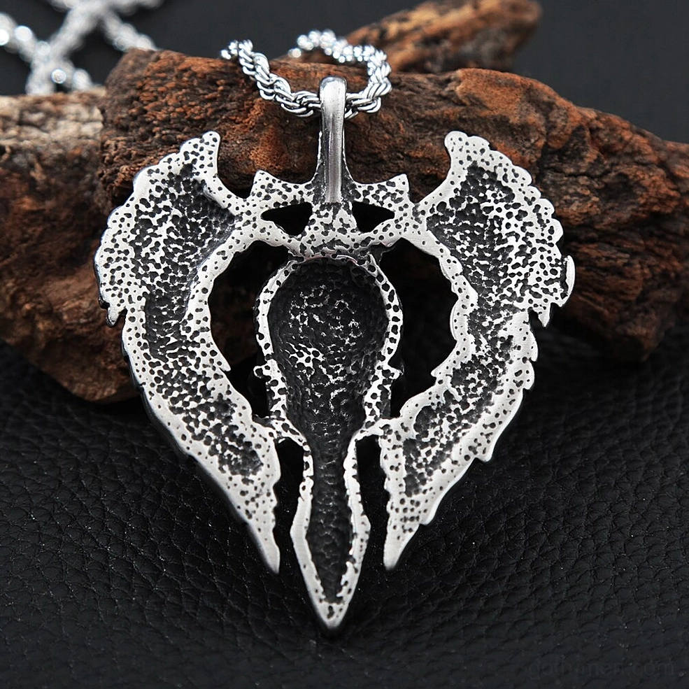 Back view of winged skull pendant necklace showcasing hollow textured reverse side and metal work details
