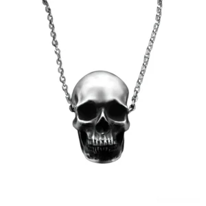 Unisex skull pendant necklace medium shot displaying pendant size and proportions against chain