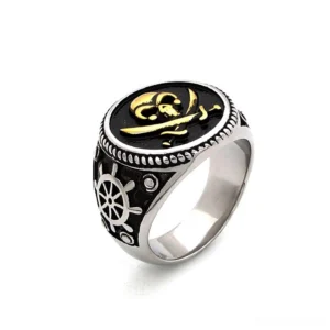 Two-tone gold and silver gothic skull ring with pirate emblem and ship wheel decoration, side angle view