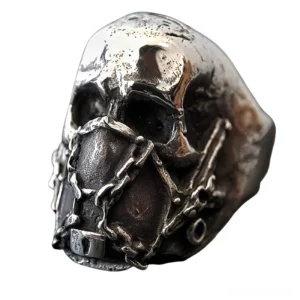 Silver stainless steel gothic skull ring with chain-bound mouth mask and lock detail, 3/4 front left angle view