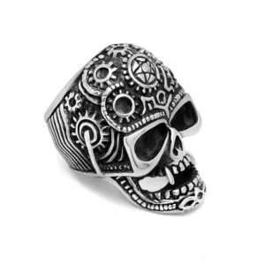 Gothic steampunk skull ring right angle view with intricate engraved gear patterns and aged silver-black finish