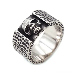 Hammered skull gothic ring 316L stainless steel top oblique view with embossed skull decoration