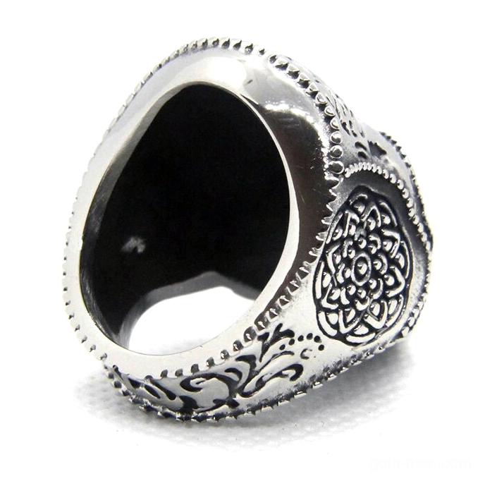 Sugar skull ring inner band detail showing filigree Celtic knot engravings and vintage silver patina on zinc alloy