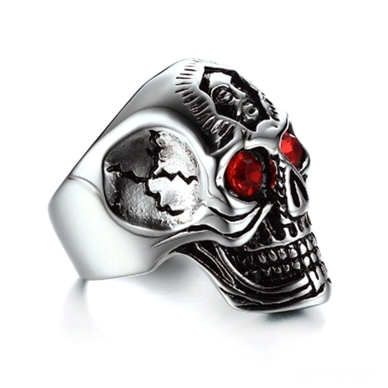 Side profile of gothic biker ring showing cracked surface texture and intricate skull details with red gems
