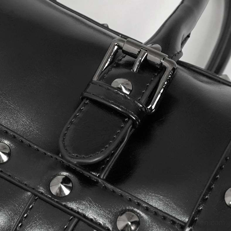 Gothic skull rivet handbag showcasing punk aesthetic, metal detailing and professional bag construction