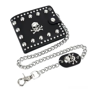 Black gothic skull rivet wallet with detachable silver metal chain and leather skull tag, shown from oblique angle on white studio background